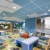 a soft play room with a table and chairs
