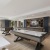 a room with tables, chairs and an air hockey table