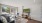 a living room with a tv and couches