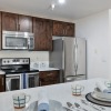 a kitchen with a table set