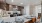 a kitchen with a table set
